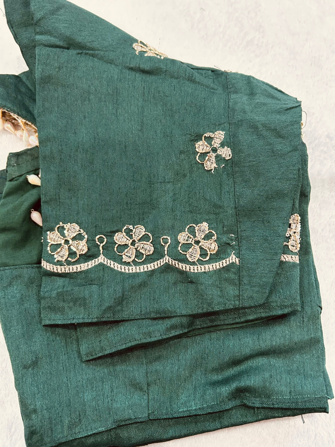 Yellow Bandhani Saree with Red Embroidered Border and Stitched Green Blouse